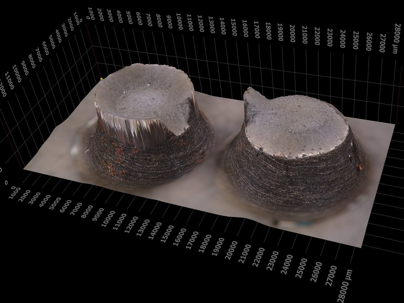 Cup-and-cone fracture surfaces of a ductile tensile specimen reconstructed in 3D