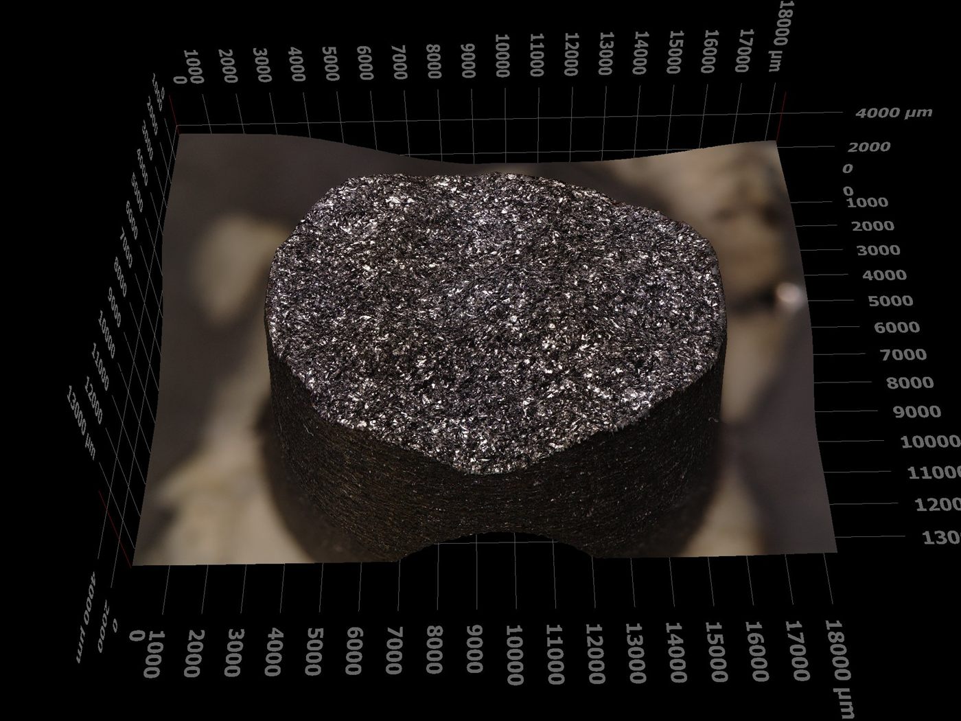 Gray iron tensile fracture surface reconstructed in 3D, flat and faceted with no necking